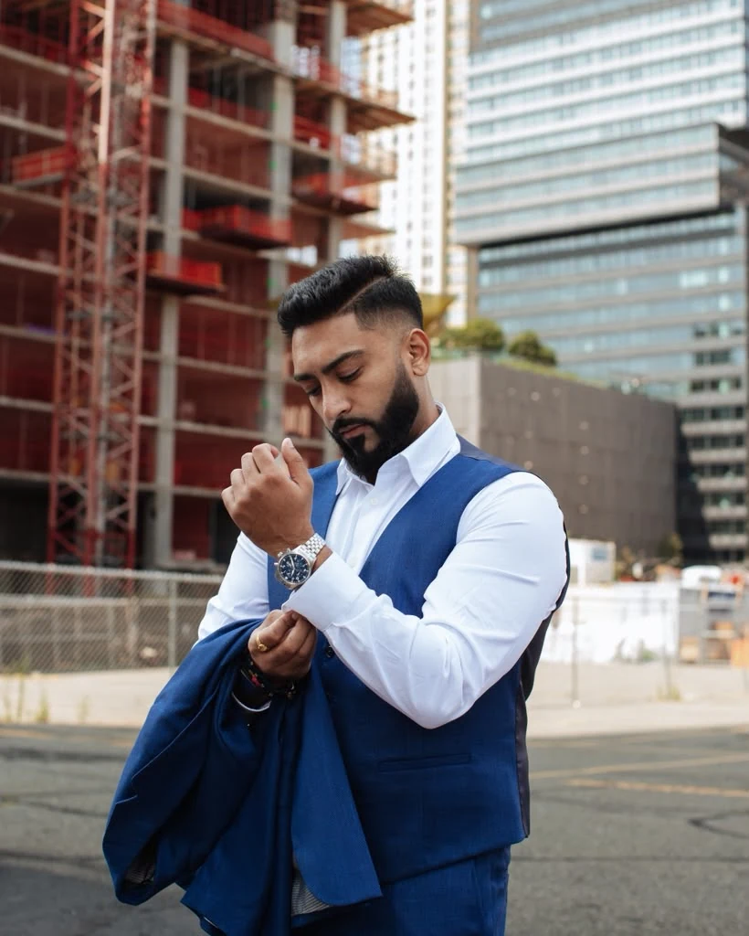Chirag Shah outside a high-rise development under construction