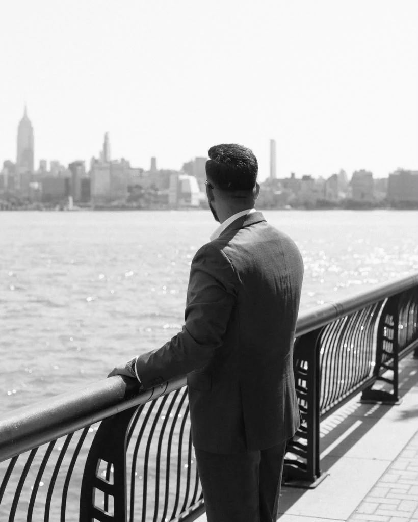 Chirag Shah looking across the Hudson toward the Manhattan skyline
