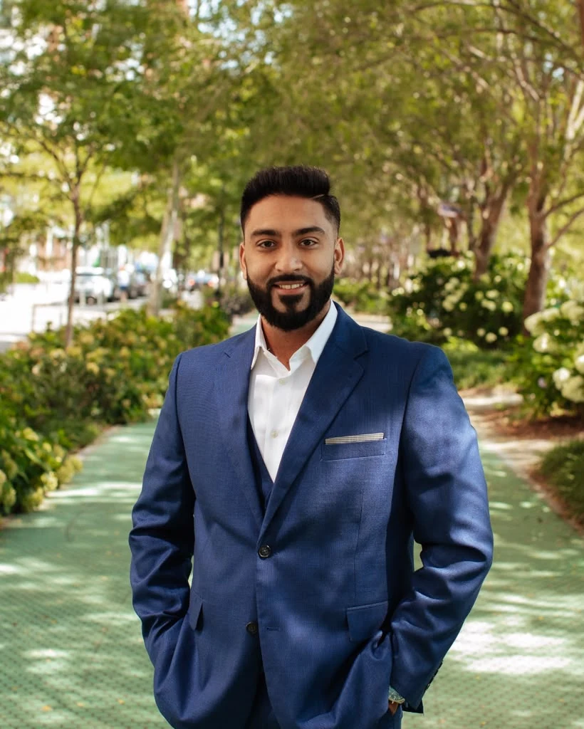 Chirag Shah, commercial real estate broker, in a navy suit