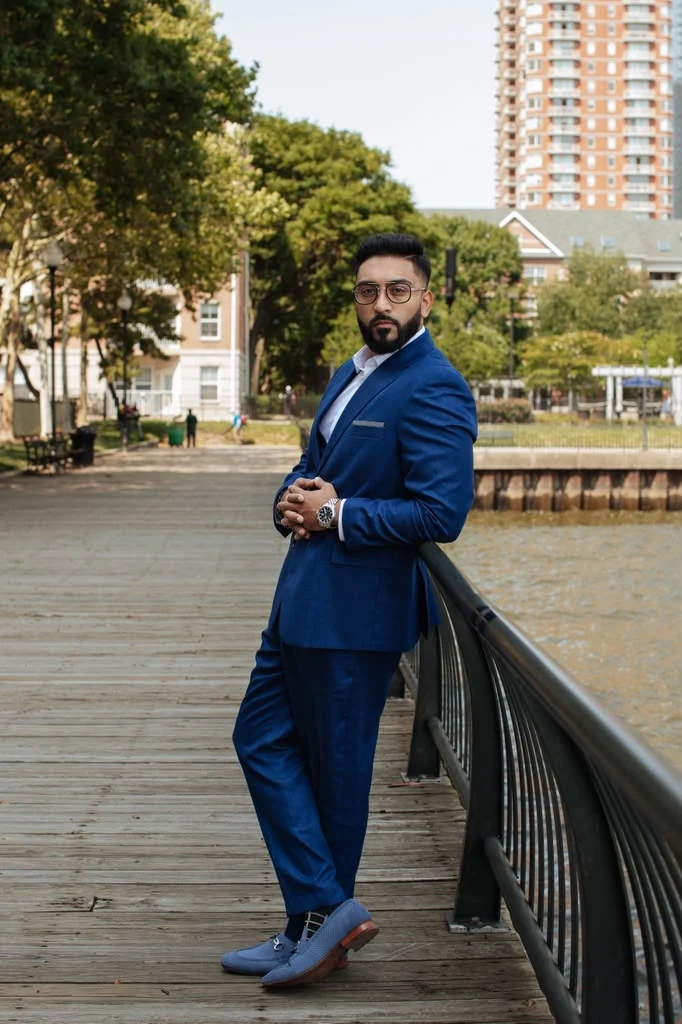 Chirag Shah on a waterfront boardwalk in Jersey City