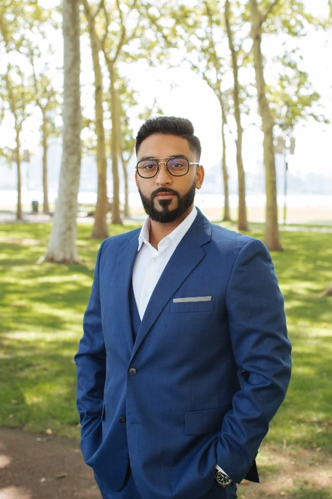 Chirag Shah, commercial real estate broker, in a navy suit